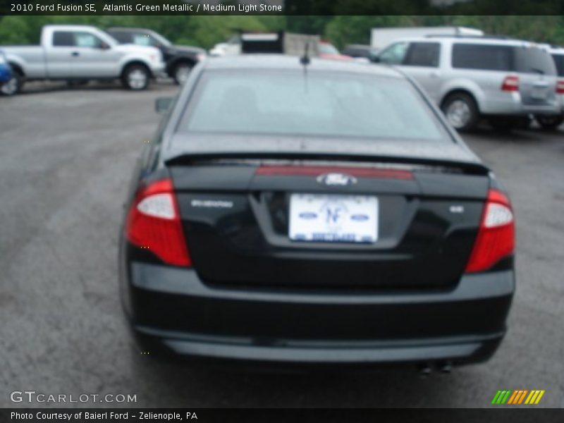 Atlantis Green Metallic / Medium Light Stone 2010 Ford Fusion SE