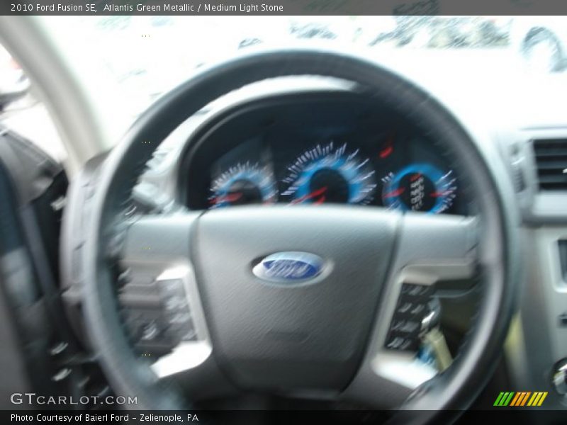 Atlantis Green Metallic / Medium Light Stone 2010 Ford Fusion SE