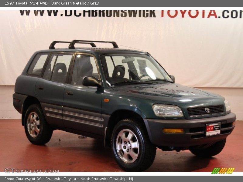 Dark Green Metallic / Gray 1997 Toyota RAV4 4WD