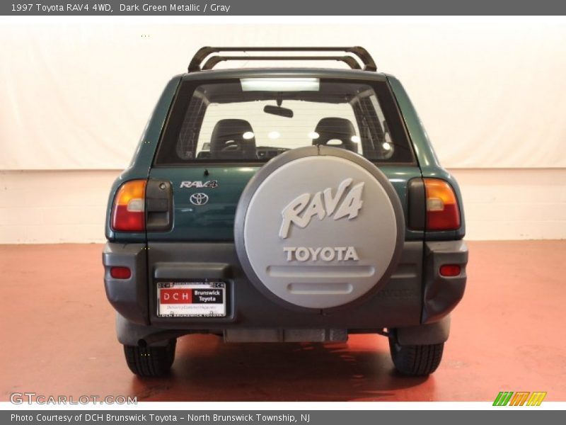Dark Green Metallic / Gray 1997 Toyota RAV4 4WD