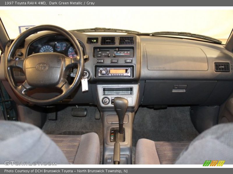 Dark Green Metallic / Gray 1997 Toyota RAV4 4WD