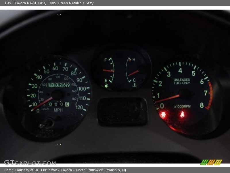 Dark Green Metallic / Gray 1997 Toyota RAV4 4WD