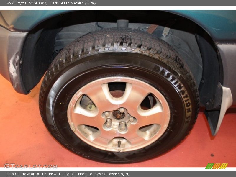 Dark Green Metallic / Gray 1997 Toyota RAV4 4WD