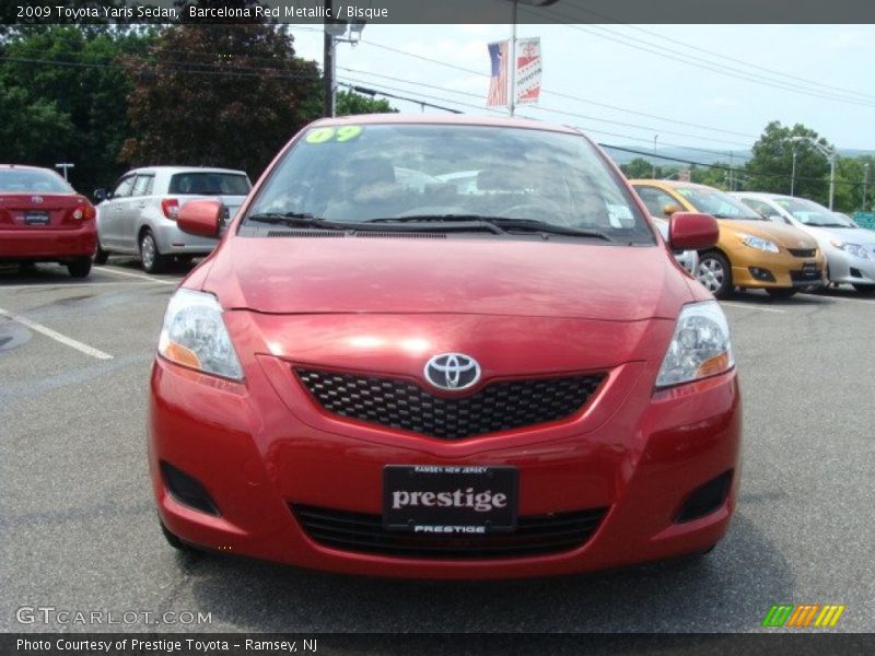 Barcelona Red Metallic / Bisque 2009 Toyota Yaris Sedan