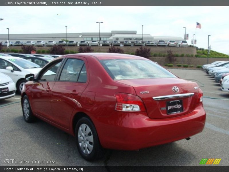 Barcelona Red Metallic / Bisque 2009 Toyota Yaris Sedan