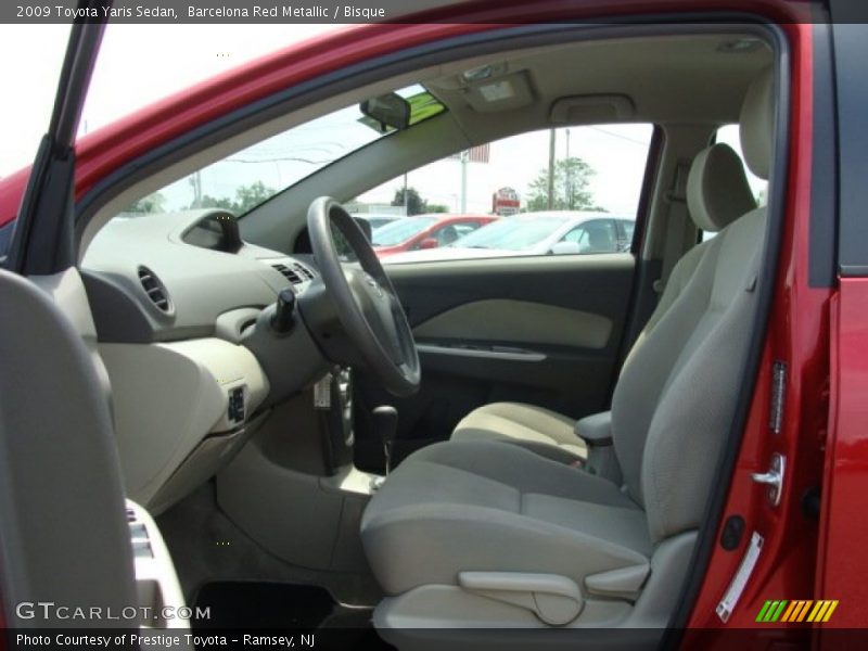 Barcelona Red Metallic / Bisque 2009 Toyota Yaris Sedan