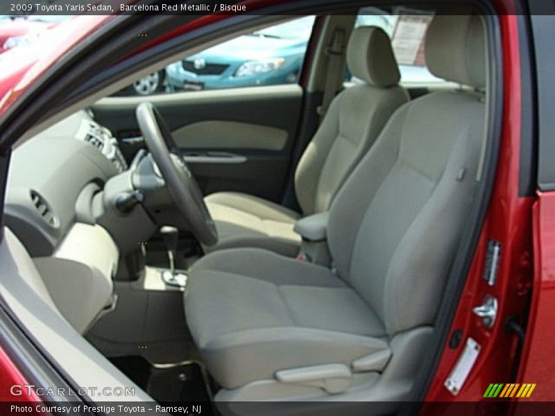 Barcelona Red Metallic / Bisque 2009 Toyota Yaris Sedan