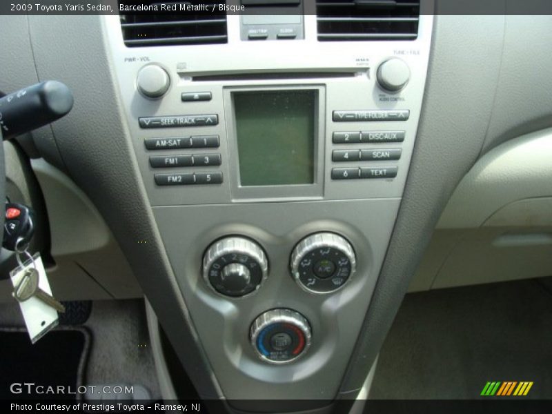 Barcelona Red Metallic / Bisque 2009 Toyota Yaris Sedan