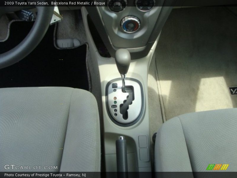 Barcelona Red Metallic / Bisque 2009 Toyota Yaris Sedan