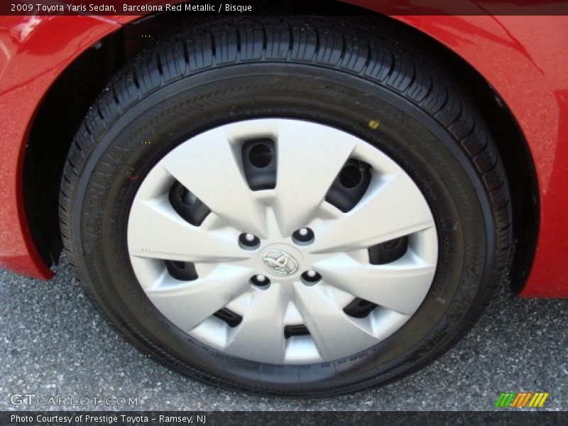 Barcelona Red Metallic / Bisque 2009 Toyota Yaris Sedan