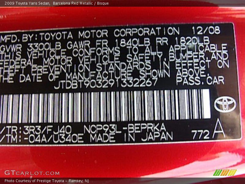 Barcelona Red Metallic / Bisque 2009 Toyota Yaris Sedan