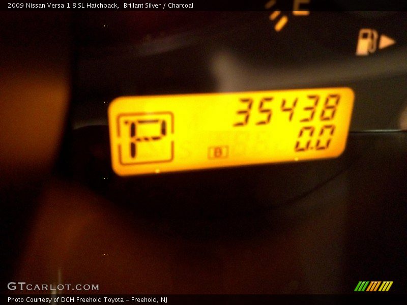 Brillant Silver / Charcoal 2009 Nissan Versa 1.8 SL Hatchback