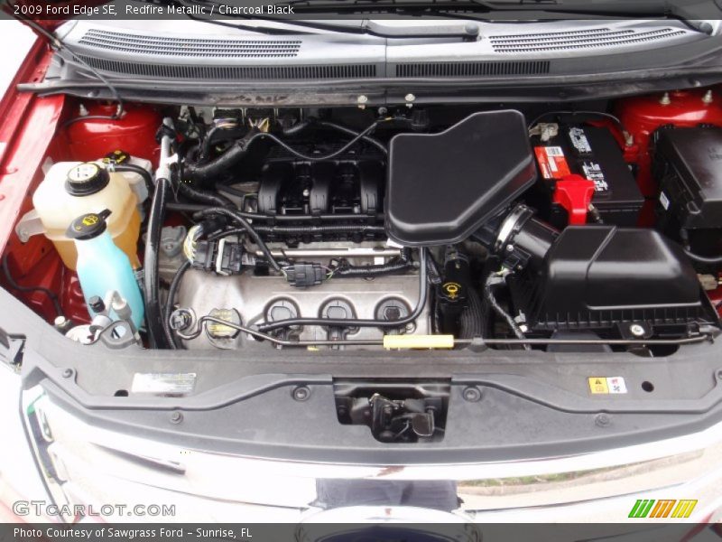 Redfire Metallic / Charcoal Black 2009 Ford Edge SE