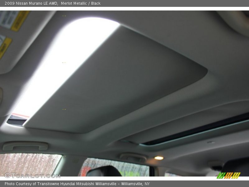 Merlot Metallic / Black 2009 Nissan Murano LE AWD