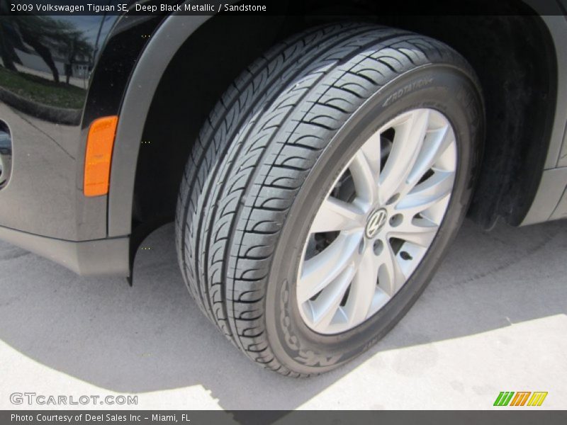 Deep Black Metallic / Sandstone 2009 Volkswagen Tiguan SE