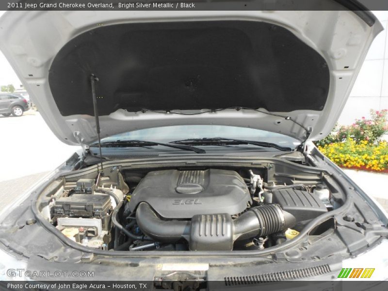 Bright Silver Metallic / Black 2011 Jeep Grand Cherokee Overland