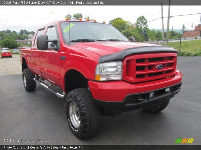 Front 3/4 View of 2003 F350 Super Duty XLT Crew Cab 4x4
