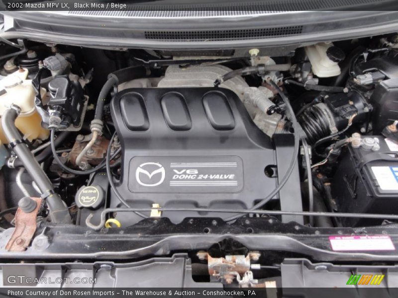 Black Mica / Beige 2002 Mazda MPV LX