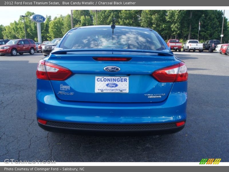 Blue Candy Metallic / Charcoal Black Leather 2012 Ford Focus Titanium Sedan