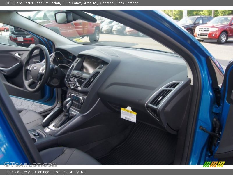 Blue Candy Metallic / Charcoal Black Leather 2012 Ford Focus Titanium Sedan