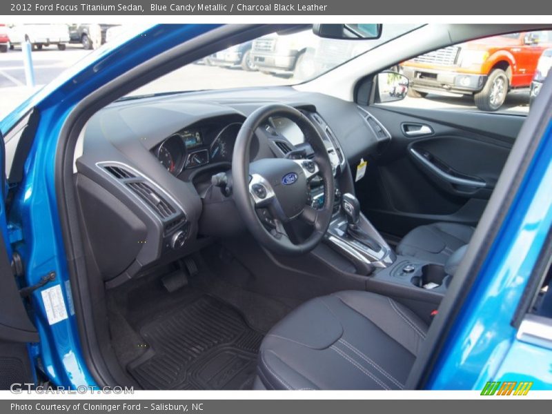 Blue Candy Metallic / Charcoal Black Leather 2012 Ford Focus Titanium Sedan