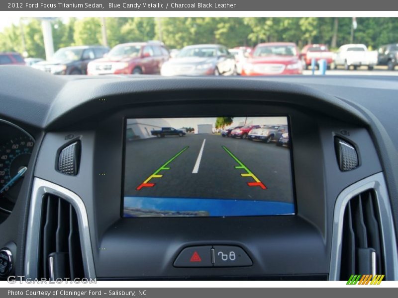 Blue Candy Metallic / Charcoal Black Leather 2012 Ford Focus Titanium Sedan