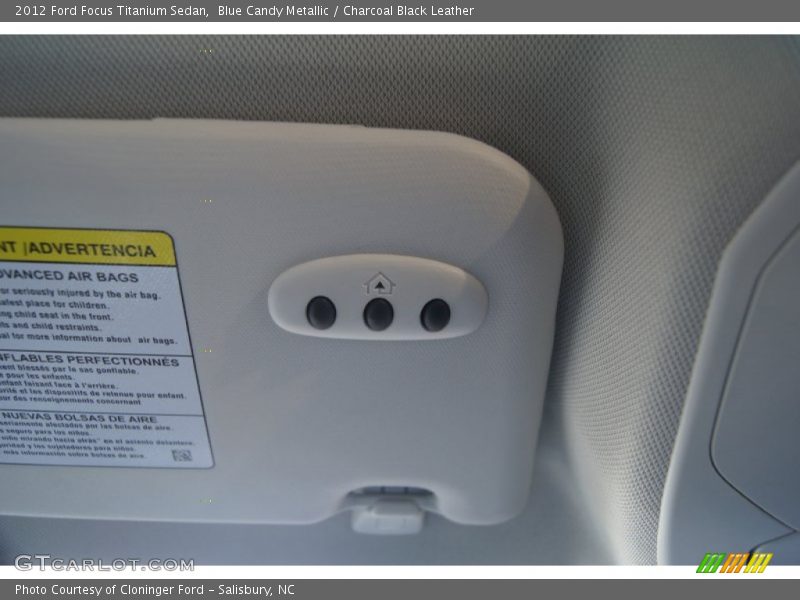 Blue Candy Metallic / Charcoal Black Leather 2012 Ford Focus Titanium Sedan