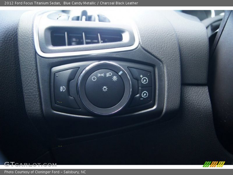 Blue Candy Metallic / Charcoal Black Leather 2012 Ford Focus Titanium Sedan
