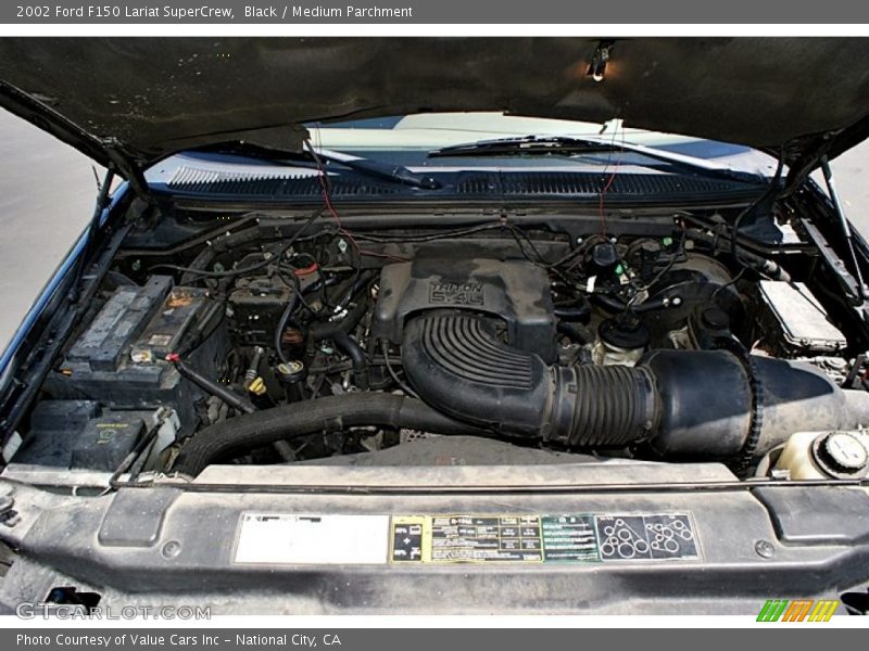 Black / Medium Parchment 2002 Ford F150 Lariat SuperCrew