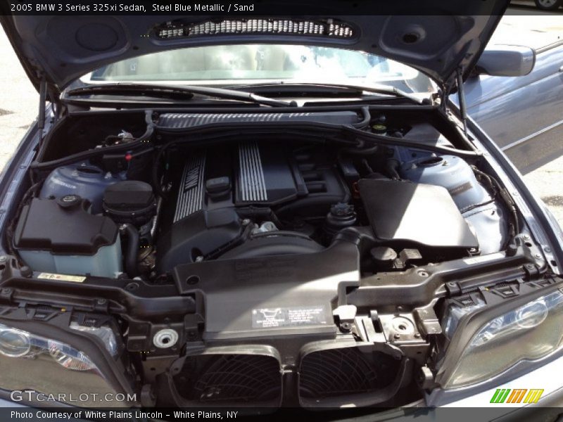 Steel Blue Metallic / Sand 2005 BMW 3 Series 325xi Sedan