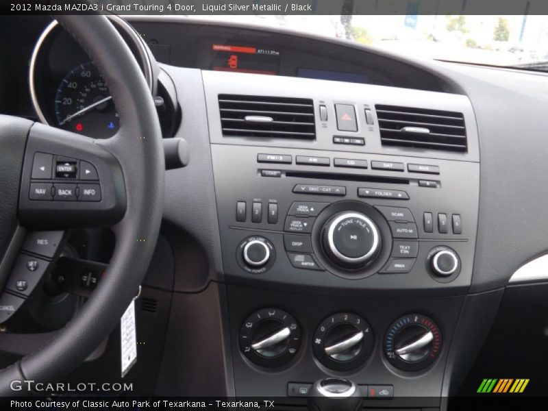 Liquid Silver Metallic / Black 2012 Mazda MAZDA3 i Grand Touring 4 Door