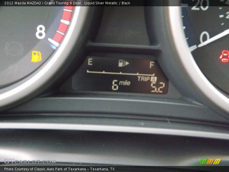 Liquid Silver Metallic / Black 2012 Mazda MAZDA3 i Grand Touring 4 Door
