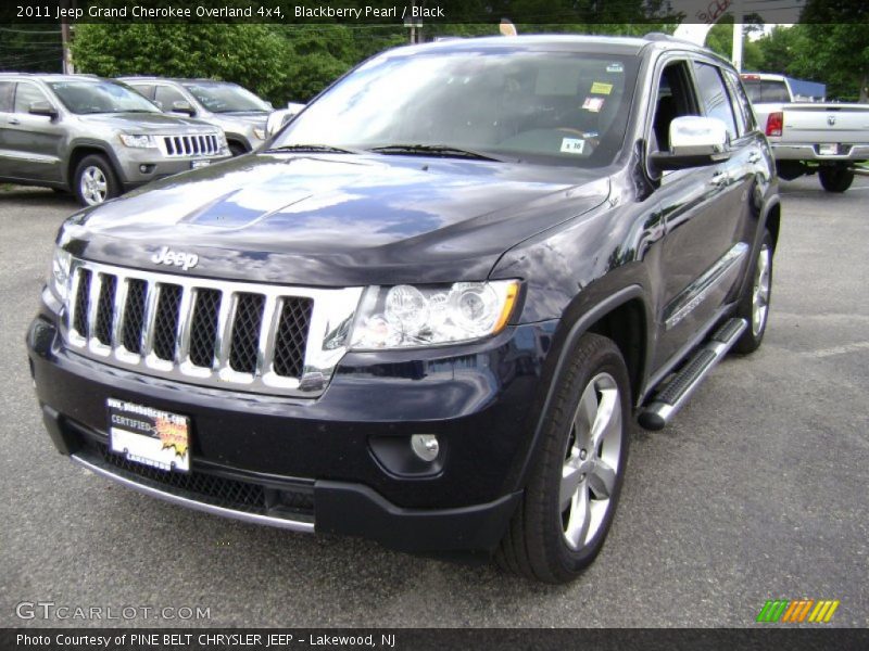 Blackberry Pearl / Black 2011 Jeep Grand Cherokee Overland 4x4