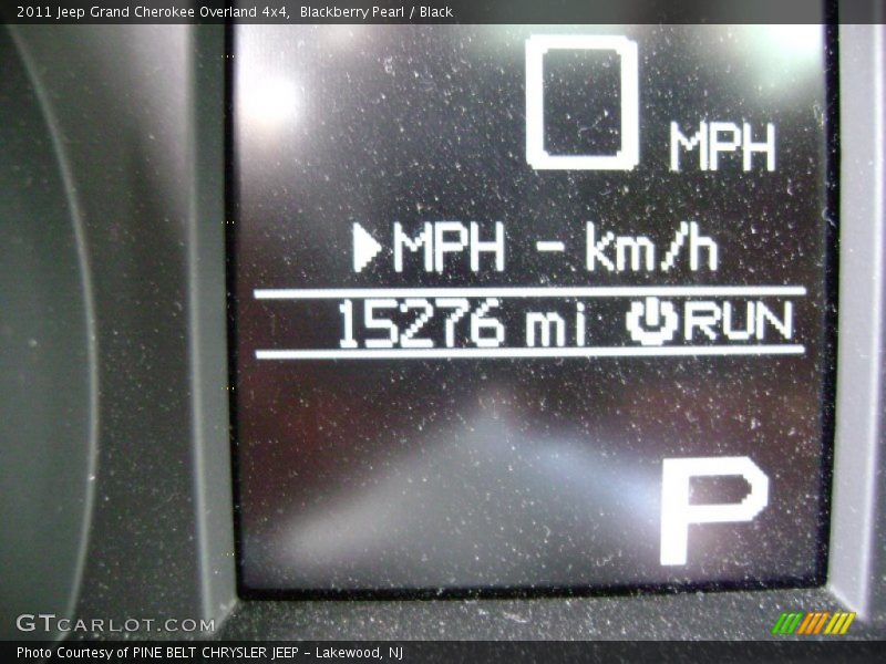 Blackberry Pearl / Black 2011 Jeep Grand Cherokee Overland 4x4