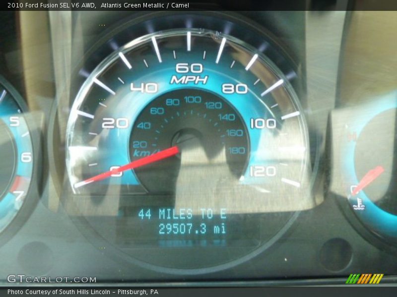 Atlantis Green Metallic / Camel 2010 Ford Fusion SEL V6 AWD