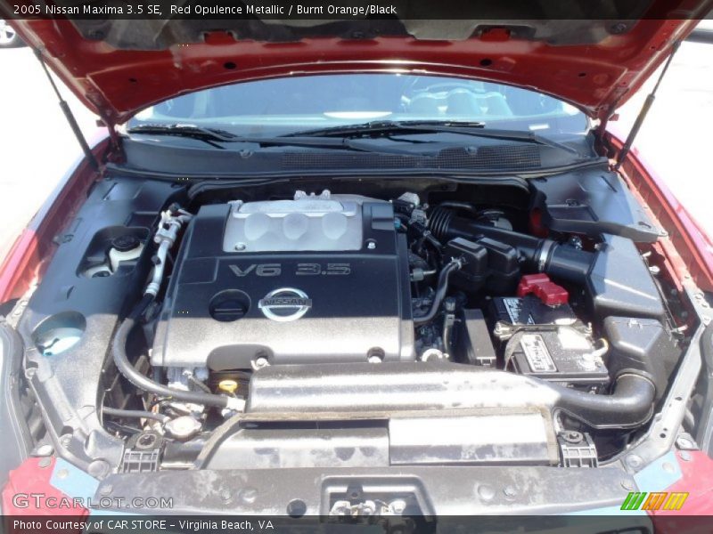 Red Opulence Metallic / Burnt Orange/Black 2005 Nissan Maxima 3.5 SE