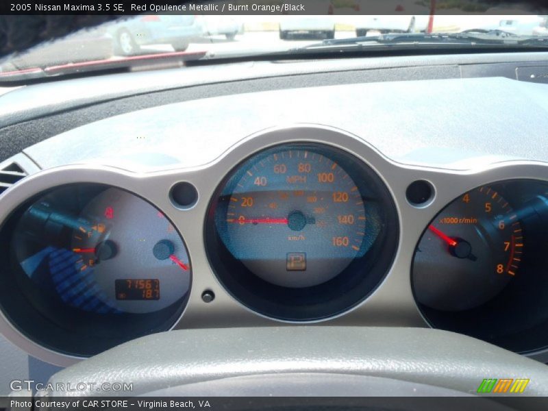 Red Opulence Metallic / Burnt Orange/Black 2005 Nissan Maxima 3.5 SE