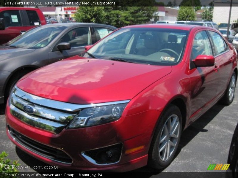 Red Candy Metallic / Medium Light Stone 2012 Ford Fusion SEL