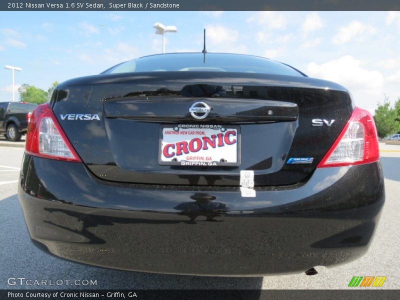 Super Black / Sandstone 2012 Nissan Versa 1.6 SV Sedan