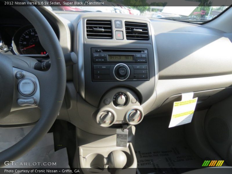 Super Black / Sandstone 2012 Nissan Versa 1.6 SV Sedan