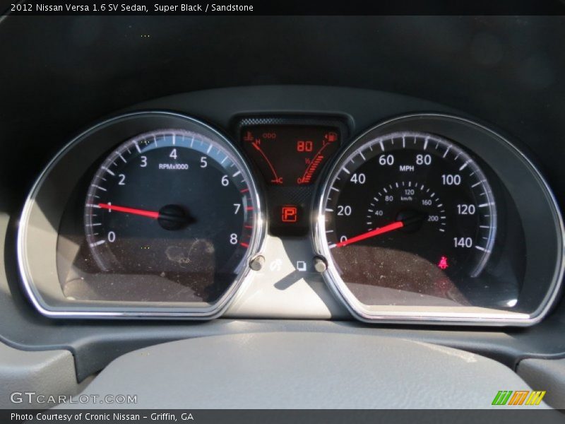 Super Black / Sandstone 2012 Nissan Versa 1.6 SV Sedan