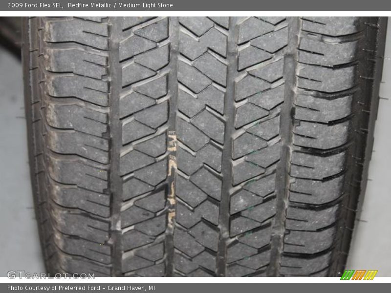 Redfire Metallic / Medium Light Stone 2009 Ford Flex SEL