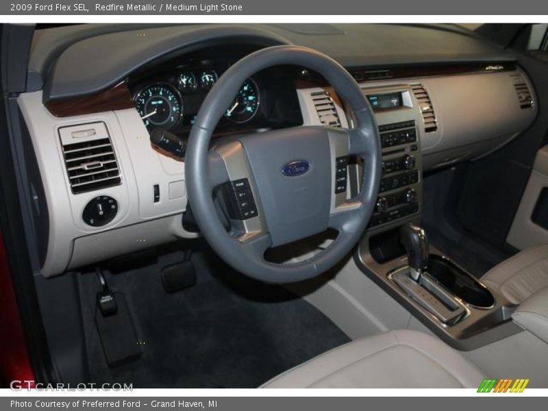 Redfire Metallic / Medium Light Stone 2009 Ford Flex SEL