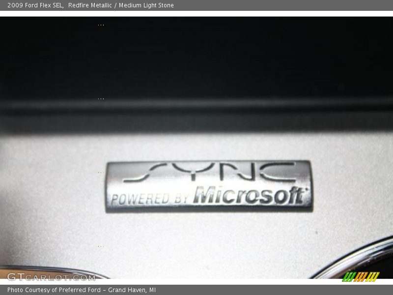 Redfire Metallic / Medium Light Stone 2009 Ford Flex SEL