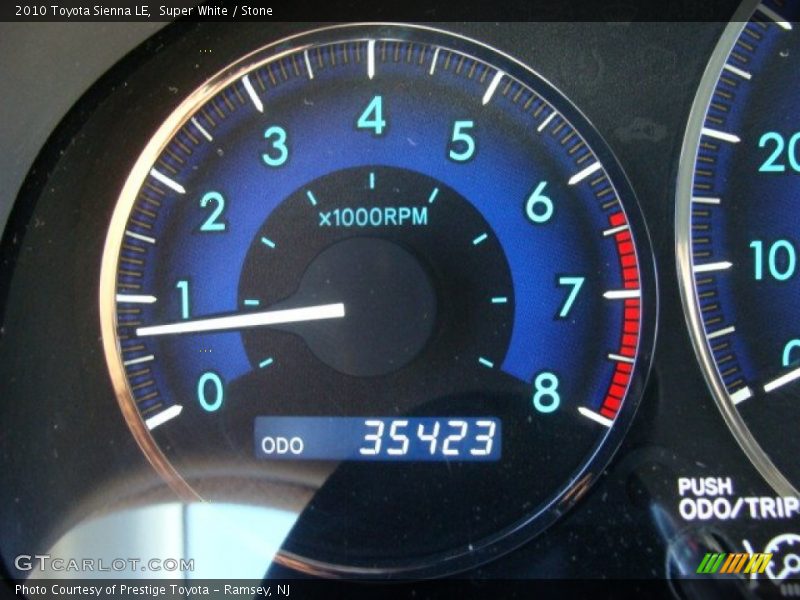 Super White / Stone 2010 Toyota Sienna LE