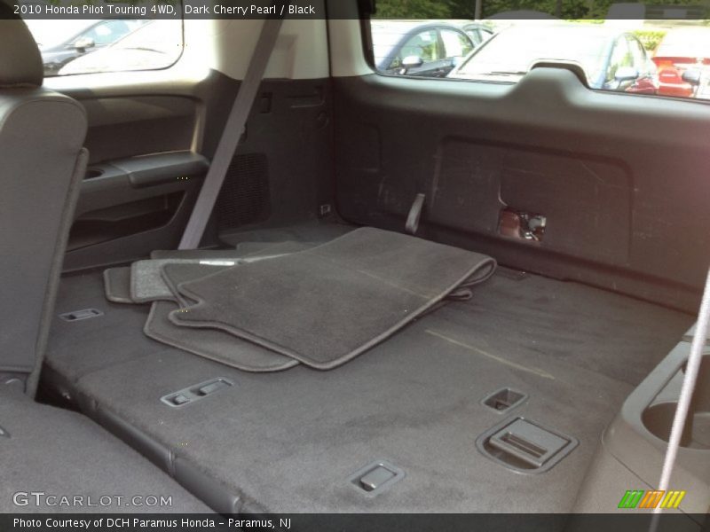 Dark Cherry Pearl / Black 2010 Honda Pilot Touring 4WD