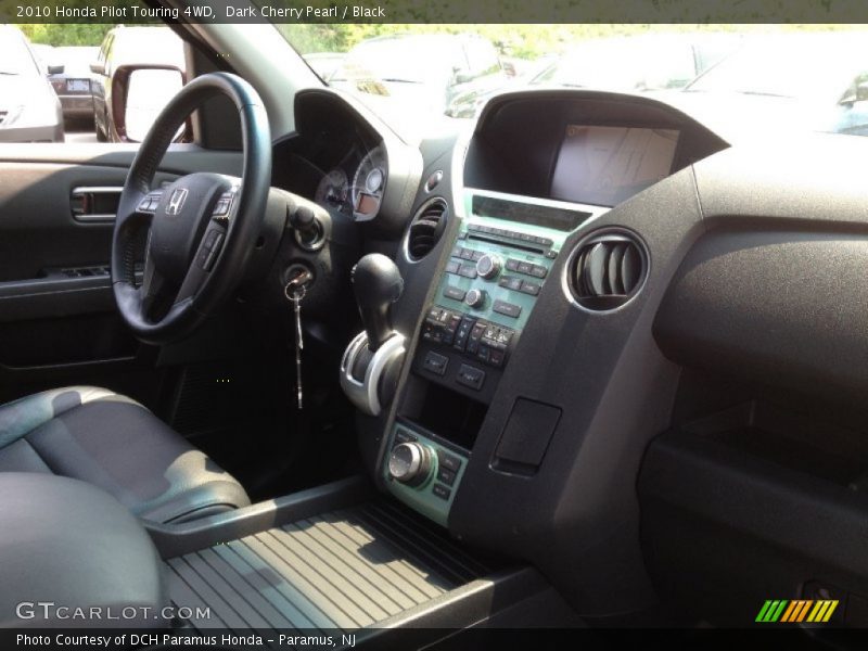 Dark Cherry Pearl / Black 2010 Honda Pilot Touring 4WD
