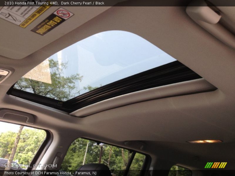 Dark Cherry Pearl / Black 2010 Honda Pilot Touring 4WD