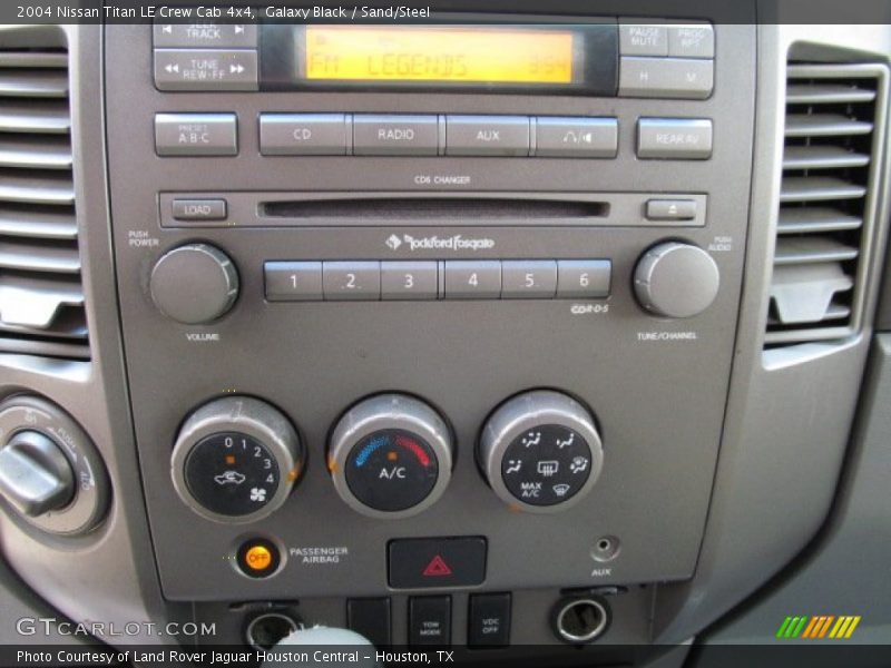 Galaxy Black / Sand/Steel 2004 Nissan Titan LE Crew Cab 4x4