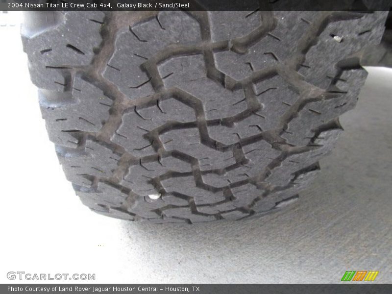 Galaxy Black / Sand/Steel 2004 Nissan Titan LE Crew Cab 4x4